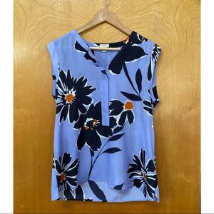 Women’s sleeveless half button floral blouse